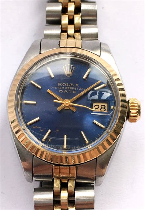 rolex ladies oyster perpetual 67197 diamond 114300 oyster perpetual with blue dial|Rolex Ladies Oyster Perpetual 67197 Diamonds.